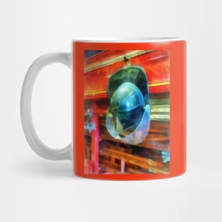 Helmet Hanging on Fire Truck Mug